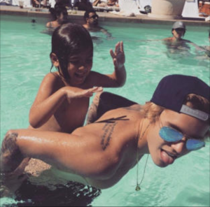 Justin Bieber and Kourtney Kardashian's 6 year old son, Mason playing in the swimming pool in May 2015.