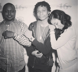 Nicki Minaj (right) with her brothers Jelani Maraj (left) and younger brother Micaiah Maraj (center). 