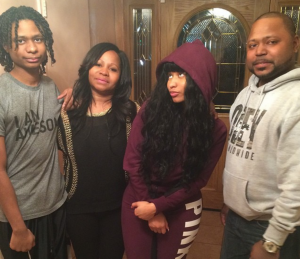 Nicki Minaj with her brothers Micaiah and Jelani Maraj and her mother Carol Maraj.