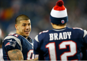 Aaron Hernandez with teammate Tom Brady, while playing for the New England Patriots.