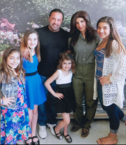 Teresa's husband Joe Giudice and their four daughters visiting Teresa in prison.