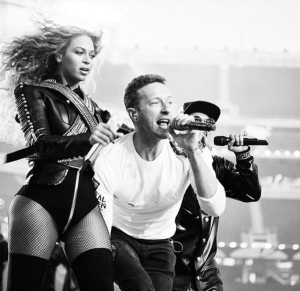 Beyoncé, Chris Martin of Coldplay, and Bruno Mars perform at the Superbowl 50 Halftime Show. 