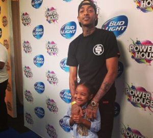 Nipsey Hussle and daughter Emani